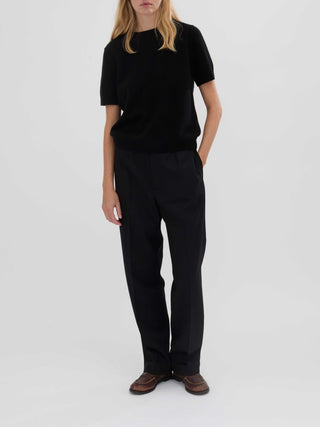 Black women's blouse knitted in 12-gauge 100% Grade A Inner Mongolian cashmere, featuring a cropped, boxy silhouette and short sleeves