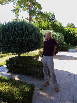 Unisex Bordeaux cashmere polo with a relaxed, boxy silhouette, crafted from 100% Grade A Inner Mongolian cashmere