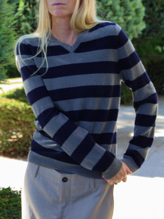 Navy blue and solid grey striped fitted V-neck cashmere sweater with wide stripes, clean neckline, and a flattering 90s-inspired silhouette in 100% Grade A cashmere