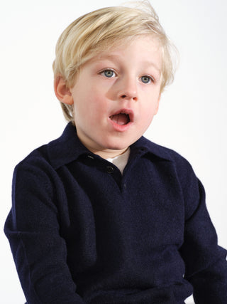 Kids’ navy blue polo shirt with long sleeves and classic collar