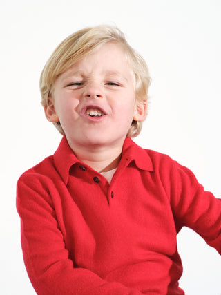 Kids’ red polo shirt with long sleeves and classic collar