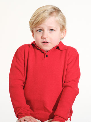 Kids’ pink polo shirt with long sleeves and classic collar