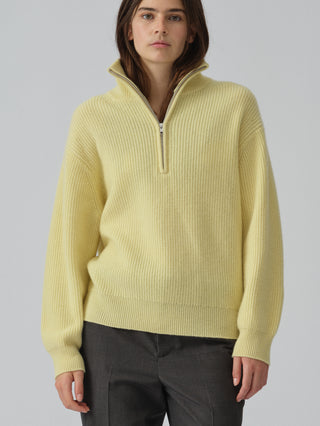 Soft yellow ribbed zip turtleneck jumper in 100% Grade A Inner Mongolian cashmere, featuring a high neck, half-zip design, and relaxed fit