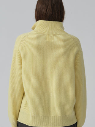 Soft yellow ribbed zip turtleneck jumper in 100% Grade A Inner Mongolian cashmere, featuring a high neck, half-zip design, and relaxed fit