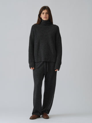 Dark Grey ribbed turtleneck jumper with a relaxed, slightly oversized fit, crafted from 100% Grade A Inner Mongolian cashmere