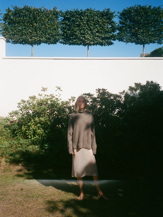 Truffle ribbed turtleneck jumper with a relaxed, slightly oversized fit, crafted from 100% Grade A Inner Mongolian cashmere