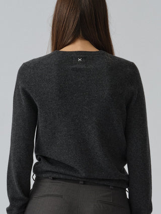 Dark grey fitted V-neck cashmere sweater with a 90s-inspired silhouette, clean neckline, and flattering slim fit in 100% Grade A cashmere