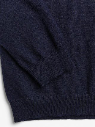 Navy blue fitted V-neck cashmere sweater with a 90s-inspired silhouette, clean neckline, and flattering slim fit in 100% Grade A cashmere