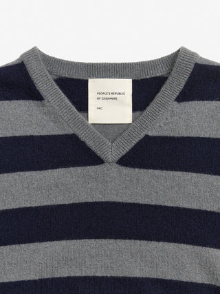 Navy blue and solid grey striped fitted V-neck cashmere sweater with wide stripes, clean neckline, and a flattering 90s-inspired silhouette in 100% Grade A cashmere