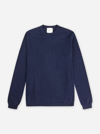 Navy blue women's fitted roundneck sweater in 12-gauge 100% Grade A Inner Mongolian cashmere, featuring a slim fit and snug round neckline