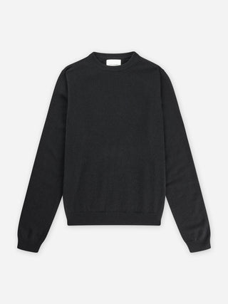 Black women's fitted roundneck sweater in 12-gauge 100% Grade A Inner Mongolian cashmere, featuring a slim fit and snug round neckline