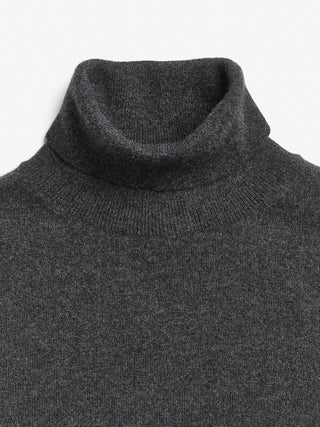 Dark grey women's turtleneck blouse in 100% Grade A Inner Mongolian cashmere, 12-gauge knit, featuring a ribbed turtle neckline, three-quarter sleeves, and a cropped fit