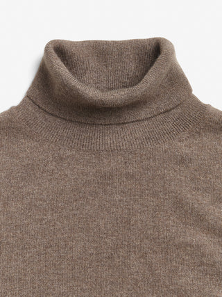 Truffle women's turtleneck blouse in 100% Grade A Inner Mongolian cashmere, 12-gauge knit, featuring a ribbed turtle neckline, three-quarter sleeves, and a cropped fit